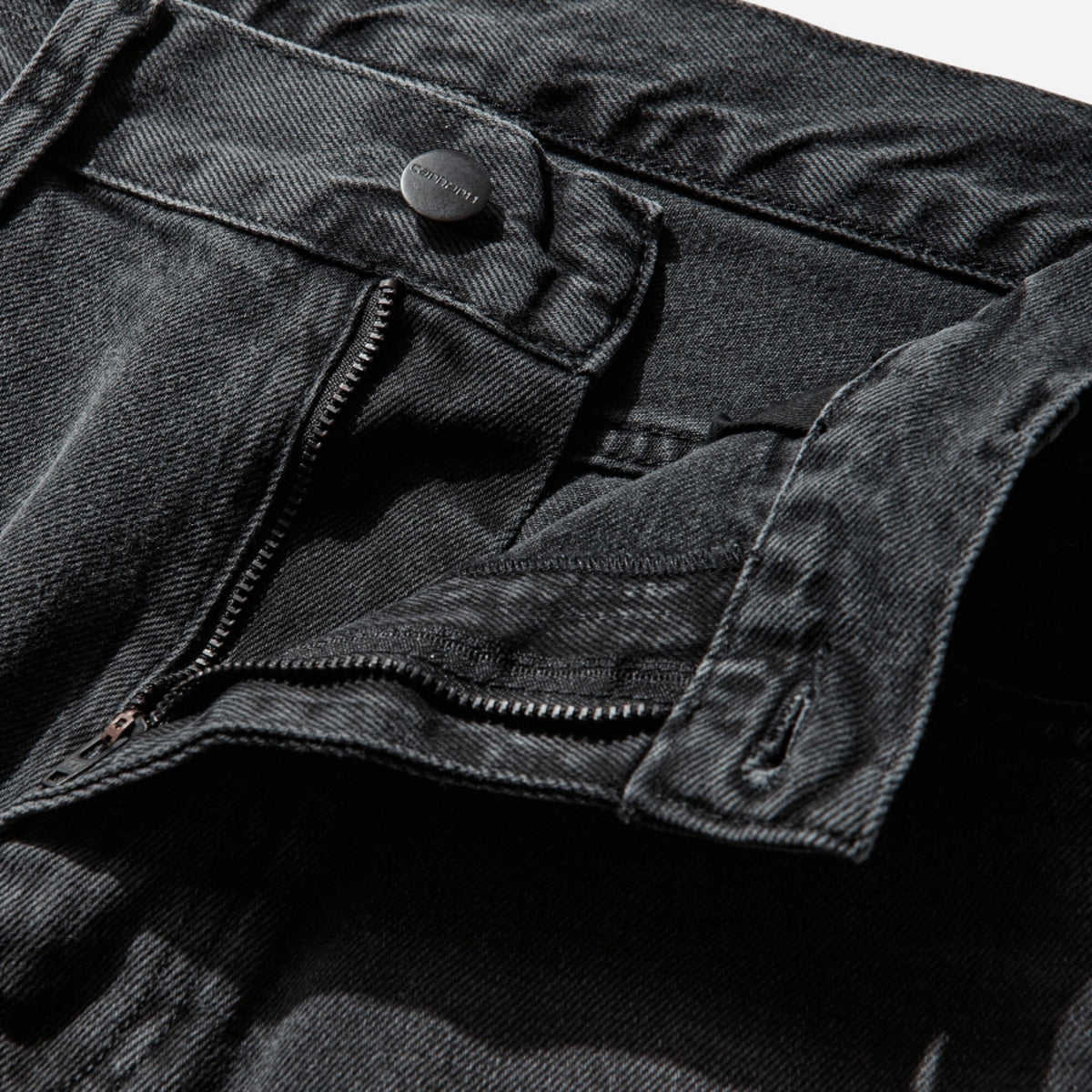Carhartt WIP Landon jeans in blue-black denim with worn, bleached finish