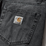 Carhartt WIP Landon jeans in blue-black denim with worn, bleached finish and relaxed fit