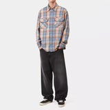 Carhartt WIP Landon jeans in blue-black denim with worn, bleached finish