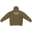 Large fit khaki Balenciaga hoodie with political campaign embroidery, showcasing bold front design and casual streetwear style.