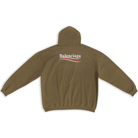 Large fit khaki Balenciaga hoodie with political campaign embroidery, showcasing bold front design and casual streetwear style.