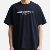 Dark navy Wooyoungmi front logo tee shirt, casual apparel with bold logo design, displayed on a plain background.
