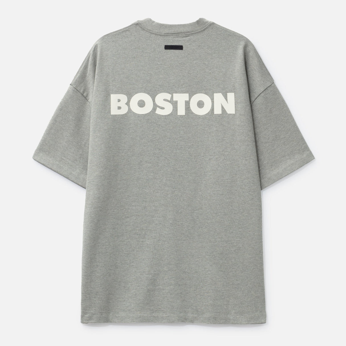 Fear of God Essentials NBA Celtics heavyweight T-shirt in concrete color, featuring Boston Celtics logo and 90s-inspired design.