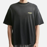 Black T-shirt featuring the Represent Owners Club logo in aged black design, casual unisex graphic tee.