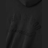 Fear Of God Essentials logo zip-up hoodie in vintage black, featuring a classic design and front logo embroidery.