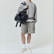Fear Of God Essentials classic logo sweat shorts in Heather Homestead, casual athletic apparel with a comfortable fit.