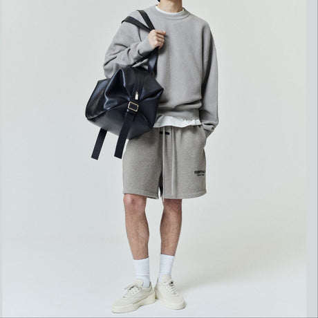 Fear Of God Essentials classic logo sweat shorts in Heather Homestead, casual athletic apparel with a comfortable fit.