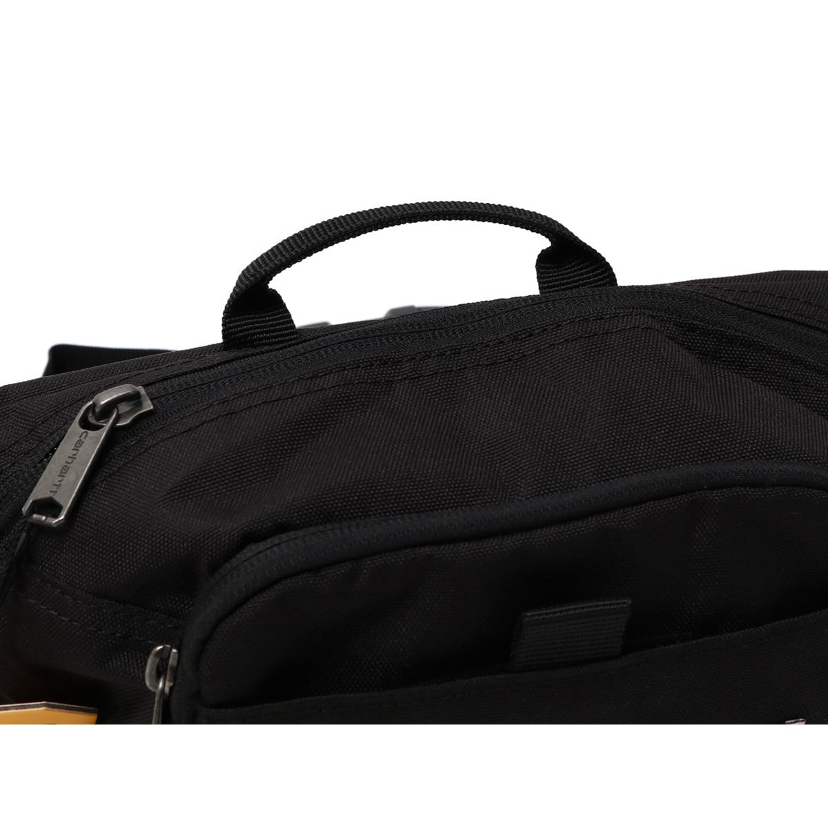 Black Carhartt Classic Waist Bag with adjustable strap and multiple compartments, designed for convenience and style.