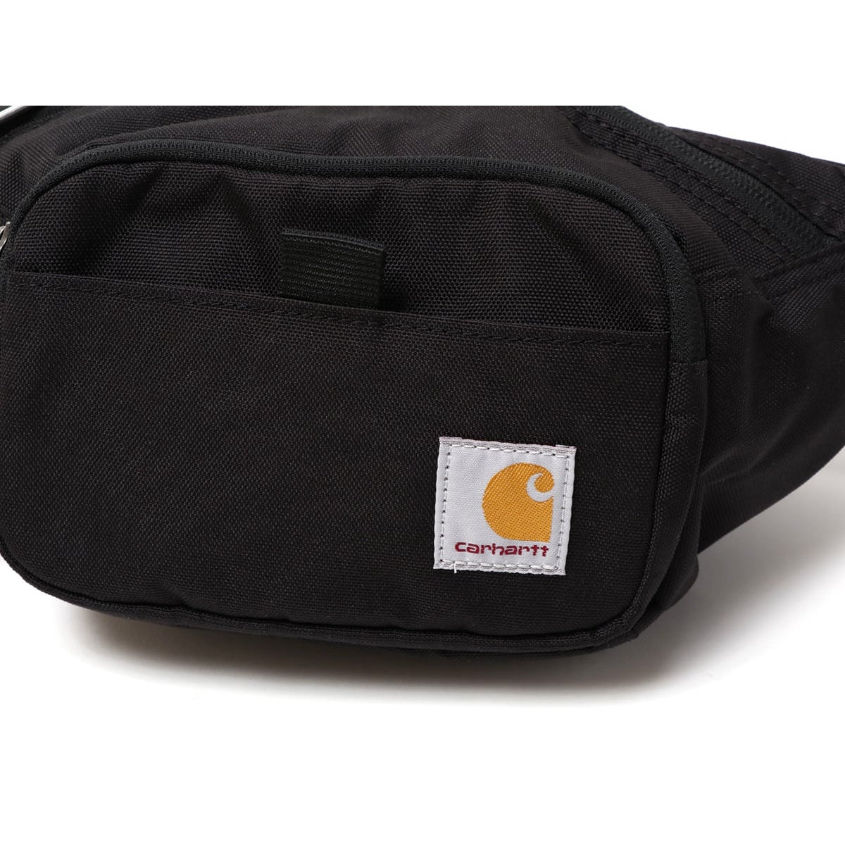 Black Carhartt Classic Waist Bag with adjustable strap and multiple compartments for convenient carrying.