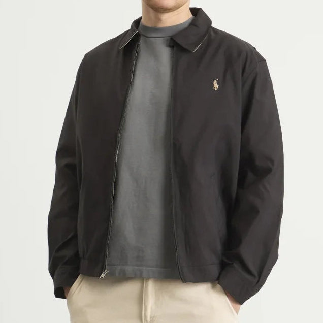 Black Polo Ralph Lauren Bi-Swing Harrington jacket with classic design and ribbed cuffs, shown on a hanger.