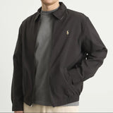 Black Polo Ralph Lauren Bi-Swing Harrington jacket shown on a person, featuring classic collar and zip front design.