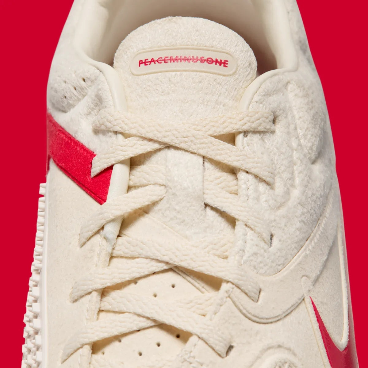 Nike PEACEMINUSONE x Cryoshot CTR360 Maestri II shoes in natural university red, featuring a sleek athletic design.