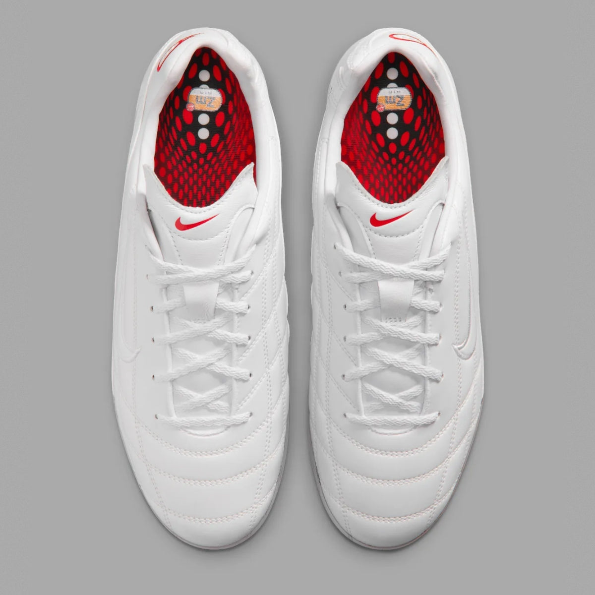 White Nike Cryoshot Zoom M9 shoes from the Virgil Abloh Archive x Nike collection, showing the sleek design and branding.
