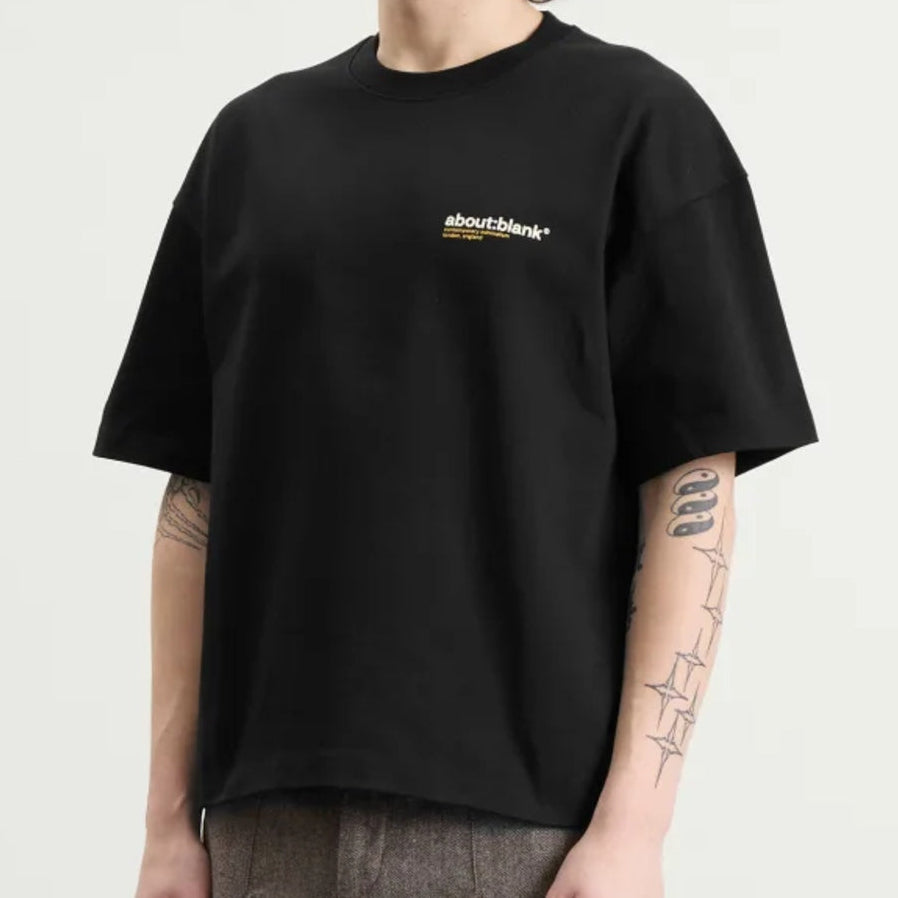 Black AboutBlank Collection Tee from ABOUT:BLANK, showing a casual, short-sleeve shirt with a relaxed fit.