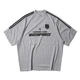 Grey MasonPrince Millennium OV raglan tee with contrasting sleeves and logo detail, casual apparel for everyday wear.