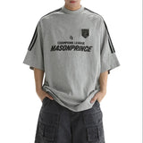 Grey MasonPrince Millennium OV Raglan Tee, casual apparel with contrasting sleeves and brand logo on the front.