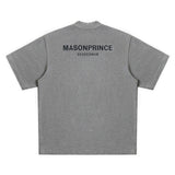 Dark grey MasonPrince reflective oversized mock neck tee, casual apparel with a relaxed fit and stylish design.