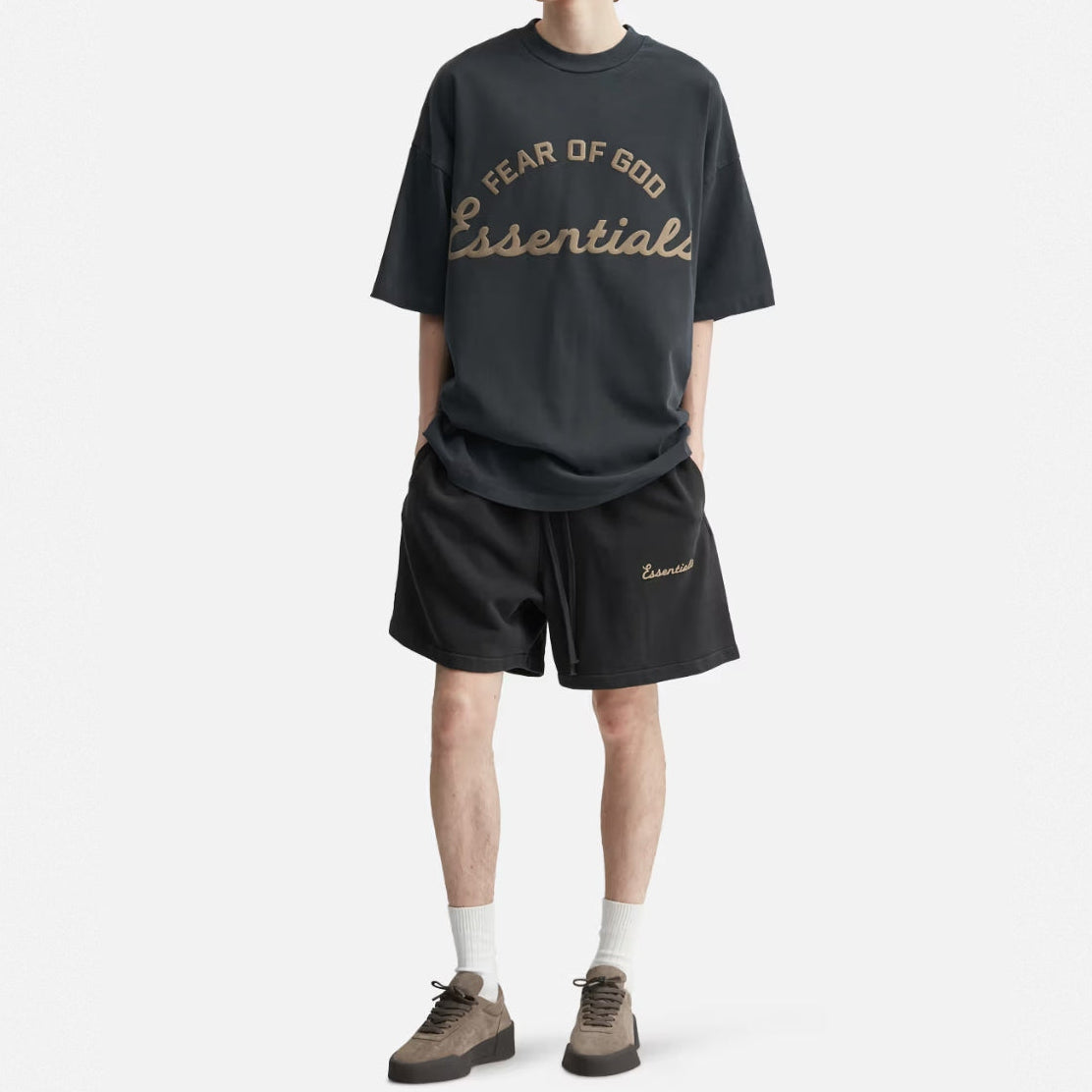 Fear of God Essentials Training 90s Shorts in faded black, casual athletic apparel with a relaxed fit and comfortable fabric.