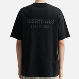 Fear of God Essentials metallic logo classic black T-shirt, front view showing logo design and soft cotton fabric.