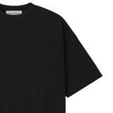 Fear of God Essentials Pique Signature 90s Tee in black, casual short-sleeve apparel with a classic fit and minimal branding.