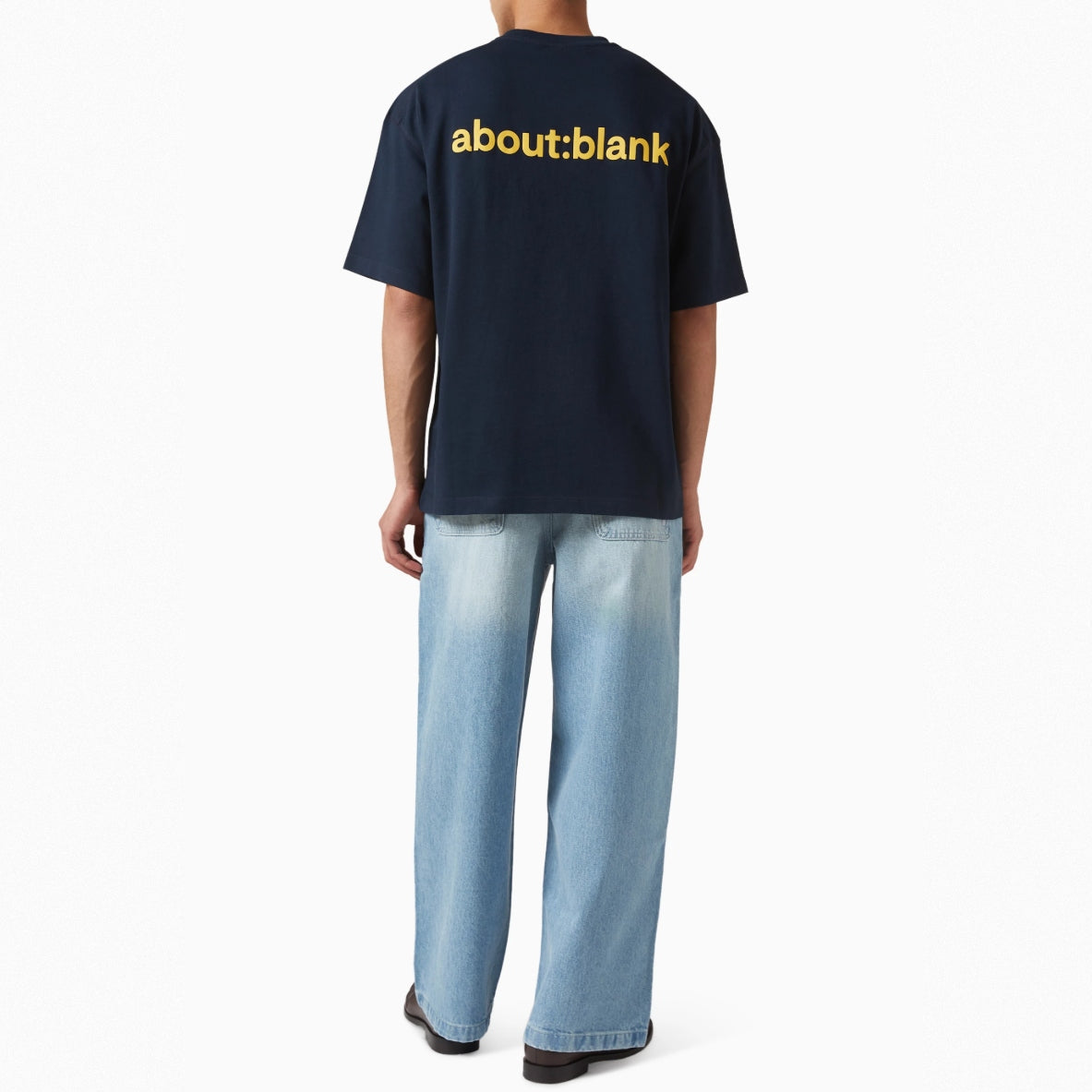 Navy AboutBlank Reverse Blank Tee shirt, casual apparel with minimalist design, shown on a plain background.