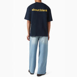 Navy AboutBlank Reverse Blank Tee shirt, casual apparel with minimalist design, shown on a plain background.