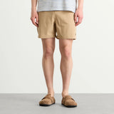 Ralph Lauren Traveler swim shorts in khaki with adjustable drawstring waist and side pockets, casual men's beachwear.