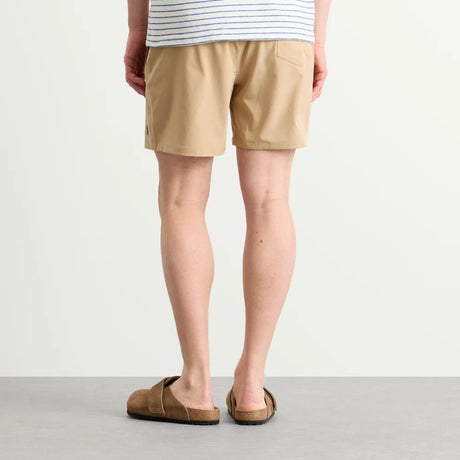 Ralph Lauren Traveler khaki swim shorts with adjustable waistband and side pockets, casual and comfortable for beach or pool.