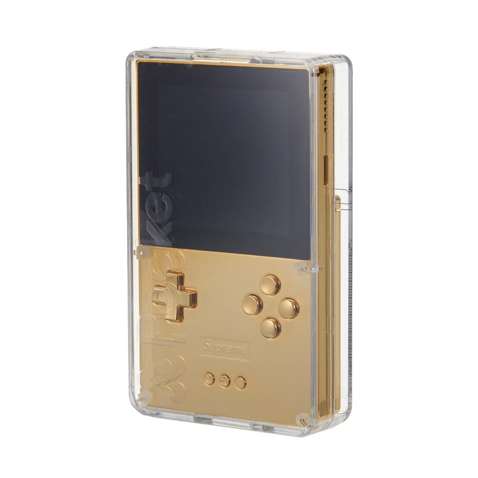 Supreme Analogue Pocket Gold apparel with gold design, featuring the Supreme logo on a stylish clothing item.