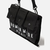 Black Human Made Military Shoulder Bag with adjustable strap and multiple compartments, designed for durable everyday use.