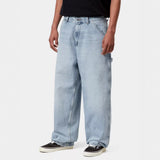 Blue Carhartt WIP Belmont pants in worn bleached style, casual denim apparel with a relaxed fit and distressed finish.