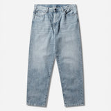 Blue Carhartt WIP Aaron Pants with a burst washed finish, casual fit, and durable cotton fabric, suitable for everyday wear.
