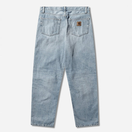 Carhartt WIP Aaron Pants in blue with burst washed finish, casual men's workwear apparel, front view showing fit and fabric details.