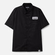 Black NEIGHBORHOOD classic work short sleeve shirt displayed flat, showing its casual design and durable fabric.