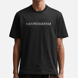 Black Mastermind Japan Rubbed Logo Tee, a stylish casual T-shirt with the brand's logo displayed on the front.
