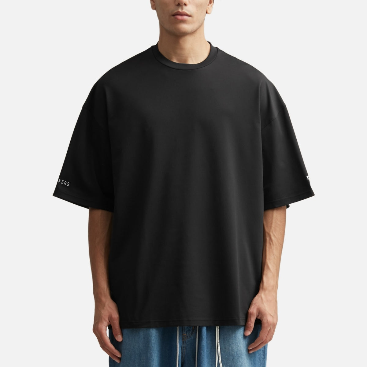Mastermind Japan X Moonrakers Back Skull Tee, boxy fit, black apparel featuring a prominent skull graphic on the back.