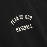 Fear of God Essentials MLB 90s Tee, casual apparel with graphic design, featuring the FEAR OF GOD ESSENTIALS branding and MLB logo.