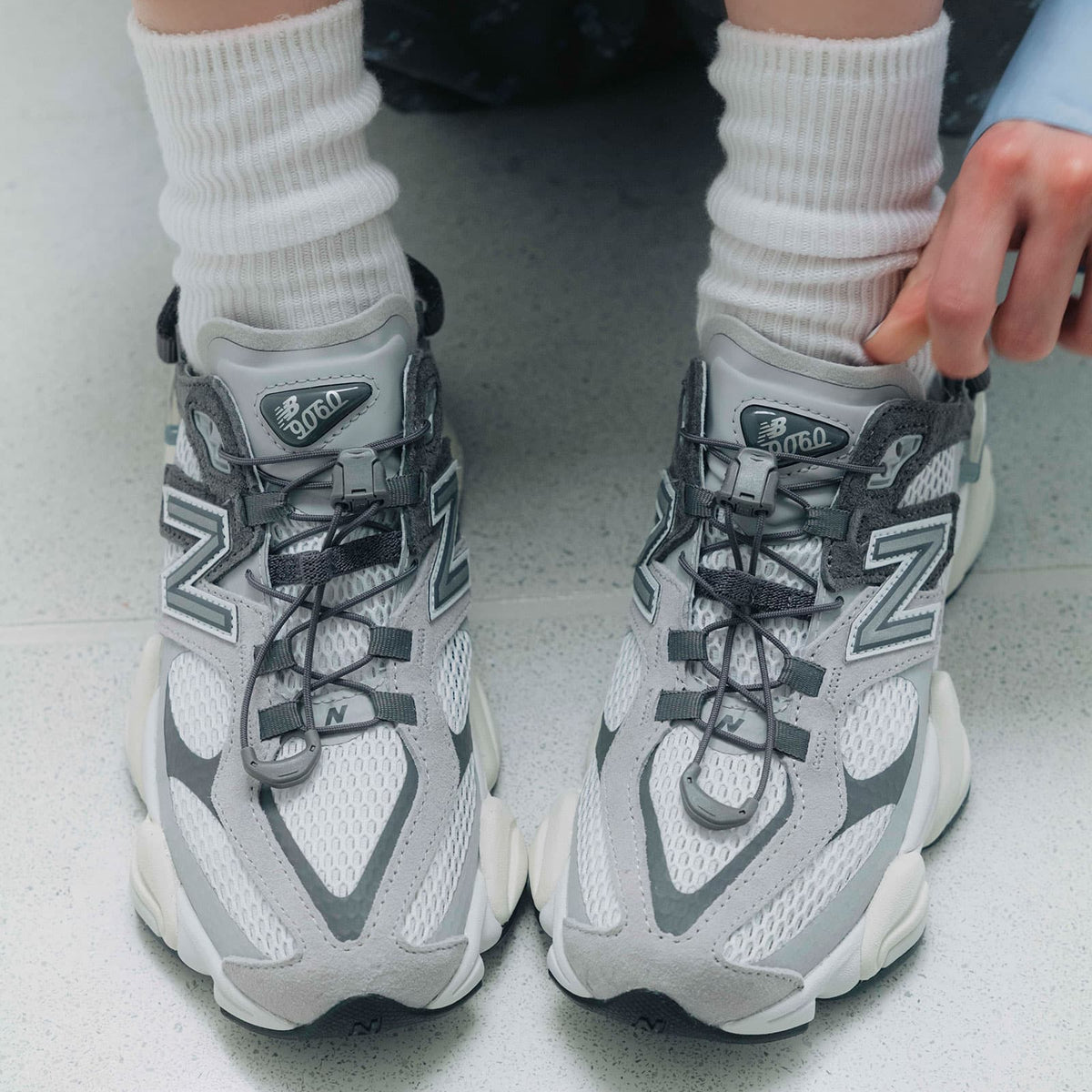 New Balance 9060 Mule Raincloud Castlerock sneakers, top view showing stylish design and comfortable fit.
