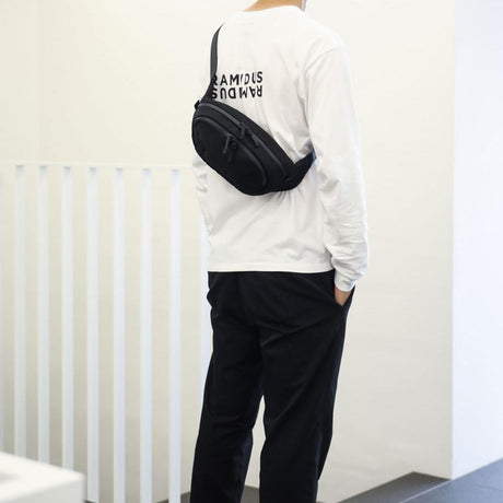 Black Ramidus Japan Beauty Waist Bag featuring adjustable strap and compact design, perfect for casual and travel use.